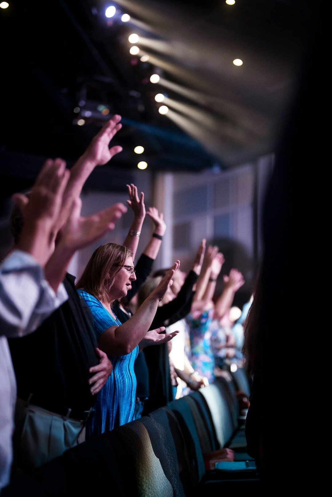 Audience applauding at the end of a conference