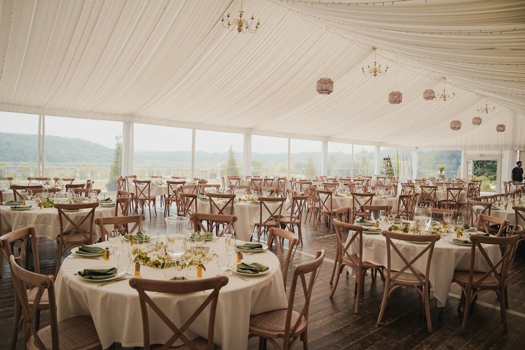 Elegant dinner event with guests at round tables